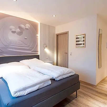 Отель Messe-hotelzimmer-appartements 4*